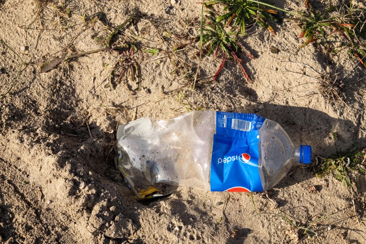 Lizzano,,Italy,-,Circa,January,,2019:,Bottle,Of,Drink,Abandoned