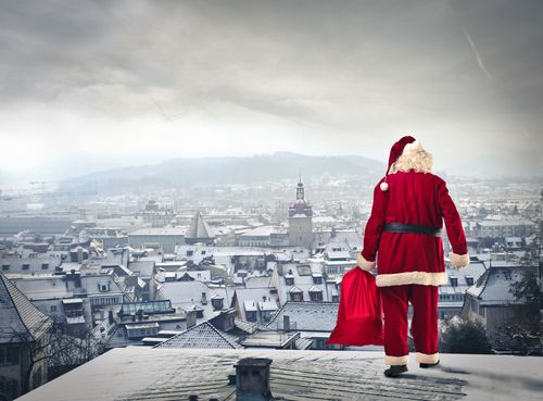 Santa,Claus,Over,The,City,With,Red,Sack