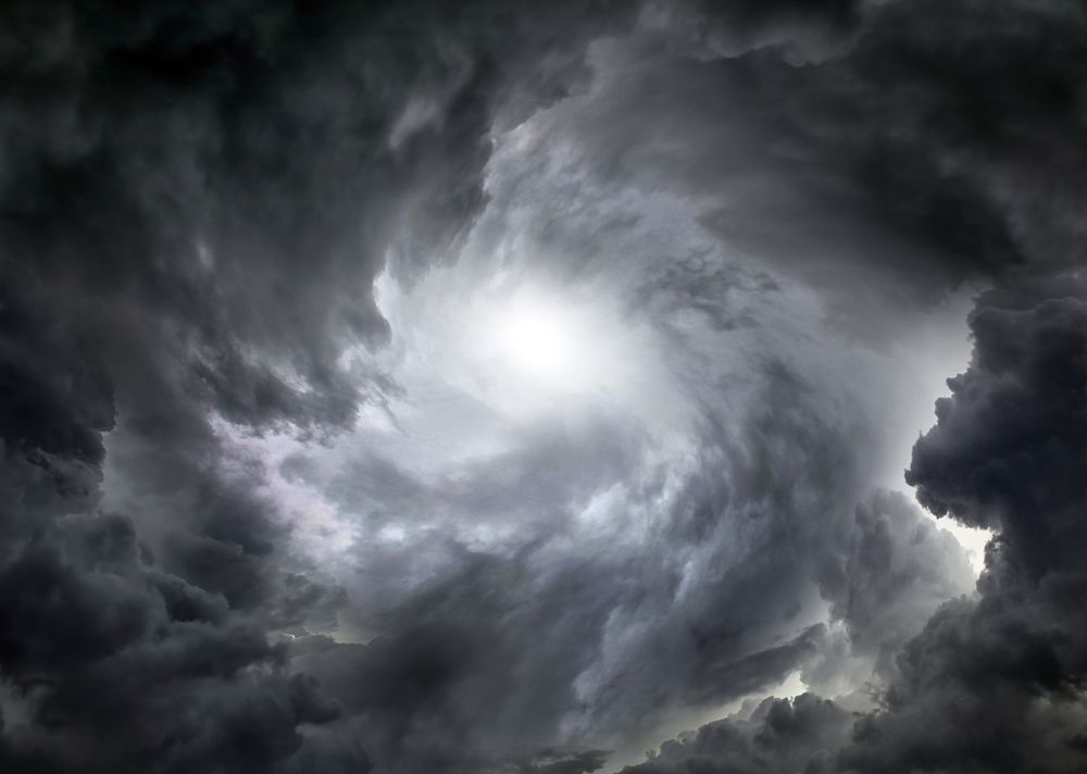 Light,In,The,Dark,And,Dramatic,Storm,Clouds