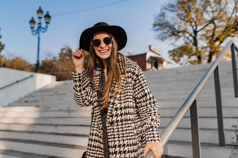 Attractive,Young,Woman,Walking,In,Autumn,Street,Wearing,Checkered,Coat,