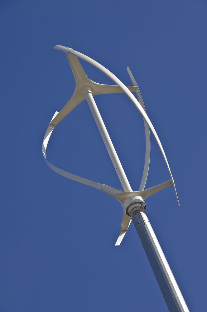 Low,Angle,Diagonal,View,Of,Vertical,Axis,Wind,Turbine,Against