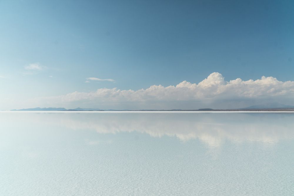 Beautiful,Mirror,Reflection,On,Blue,Sky,And,Cloud,On,Bolivia's