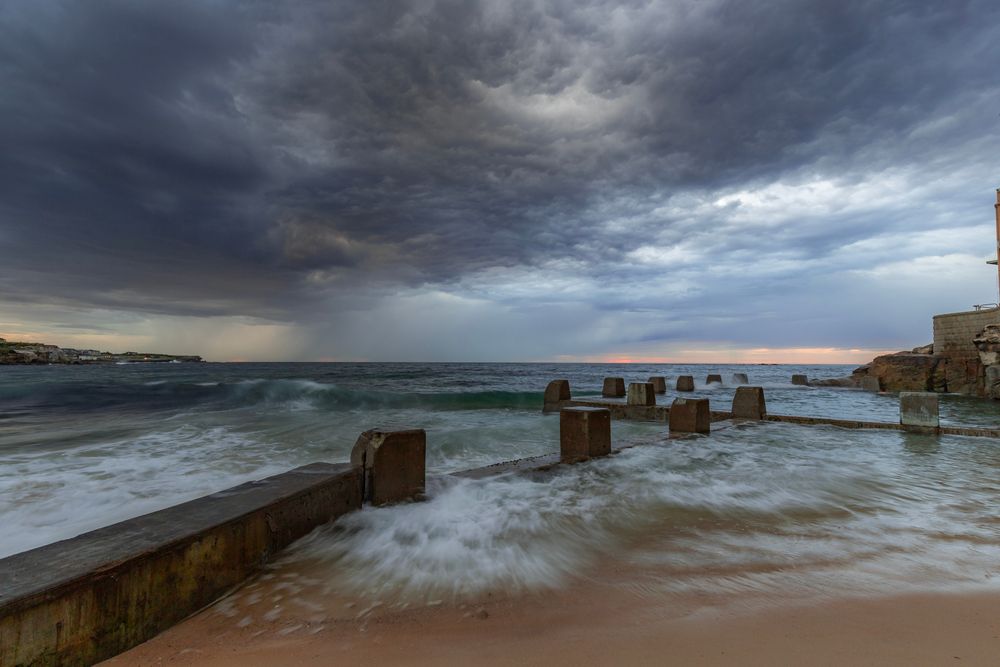 Rock,Pool,In,Australia,With,An,Angry,Sky,As,A