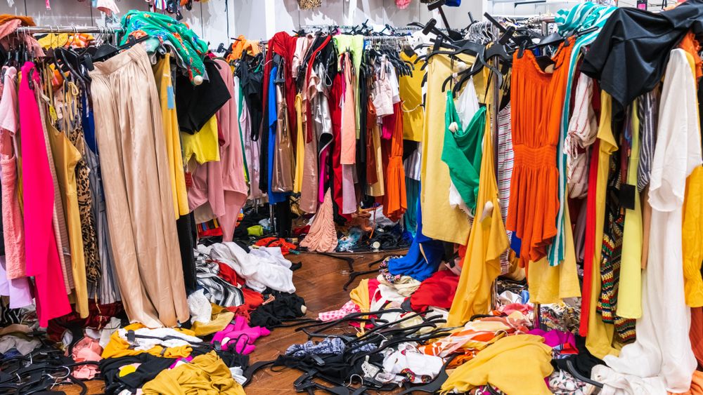 Messy,Clearance,Section,In,A,Clothing,Store,,With,Colorful,Garments