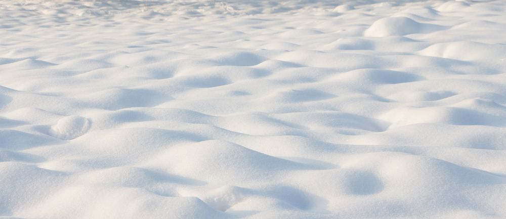 Beautiful,Natural,Snowdrift,In,Sunny,Day.,Nature,Winter,Snow,Background,