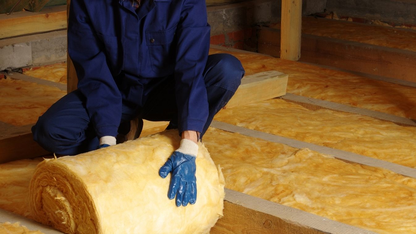 Construction,Worker,Thermally,Insulating,House,Attic,With,Glass,Wool