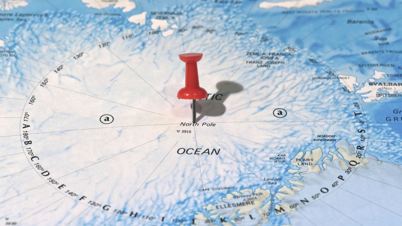 Centre,Of,North,Pole,Marked,On,Map,With,Red,Pushpin.