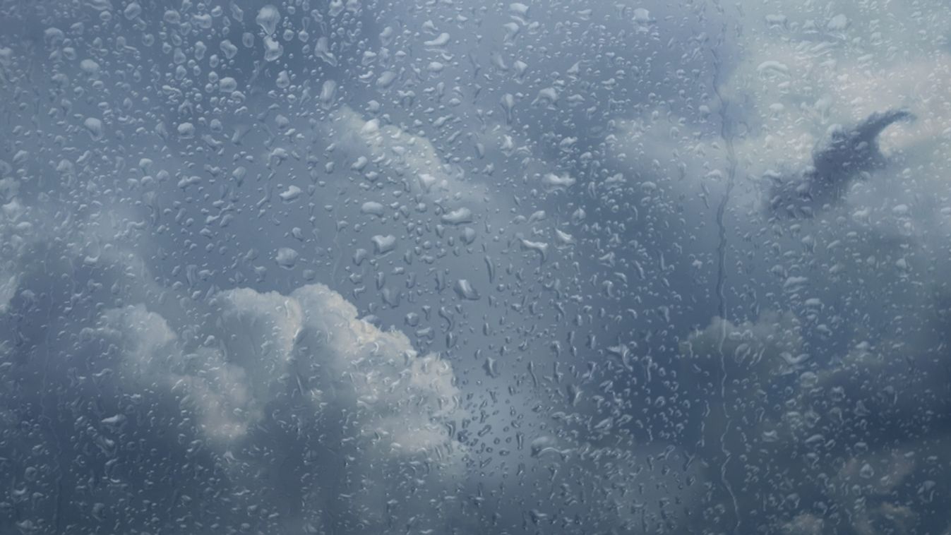 Rainy,Sky,Behind,Window,Glass.,Gloomy,And,Bad,Weather.