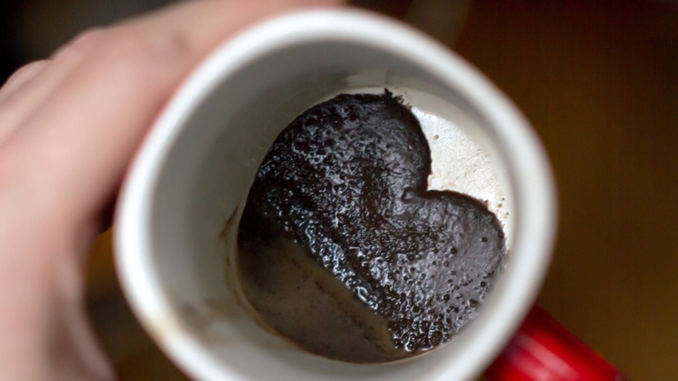 Coffee,Grounds,In,The,Shape,Of,A,Heart,In,Red