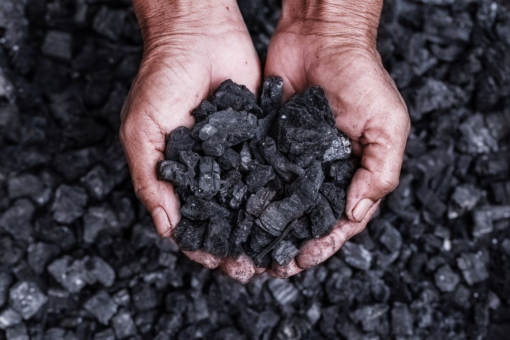 Coal,Mining,:,Coal,Miner,In,The,Man,Hands,Of