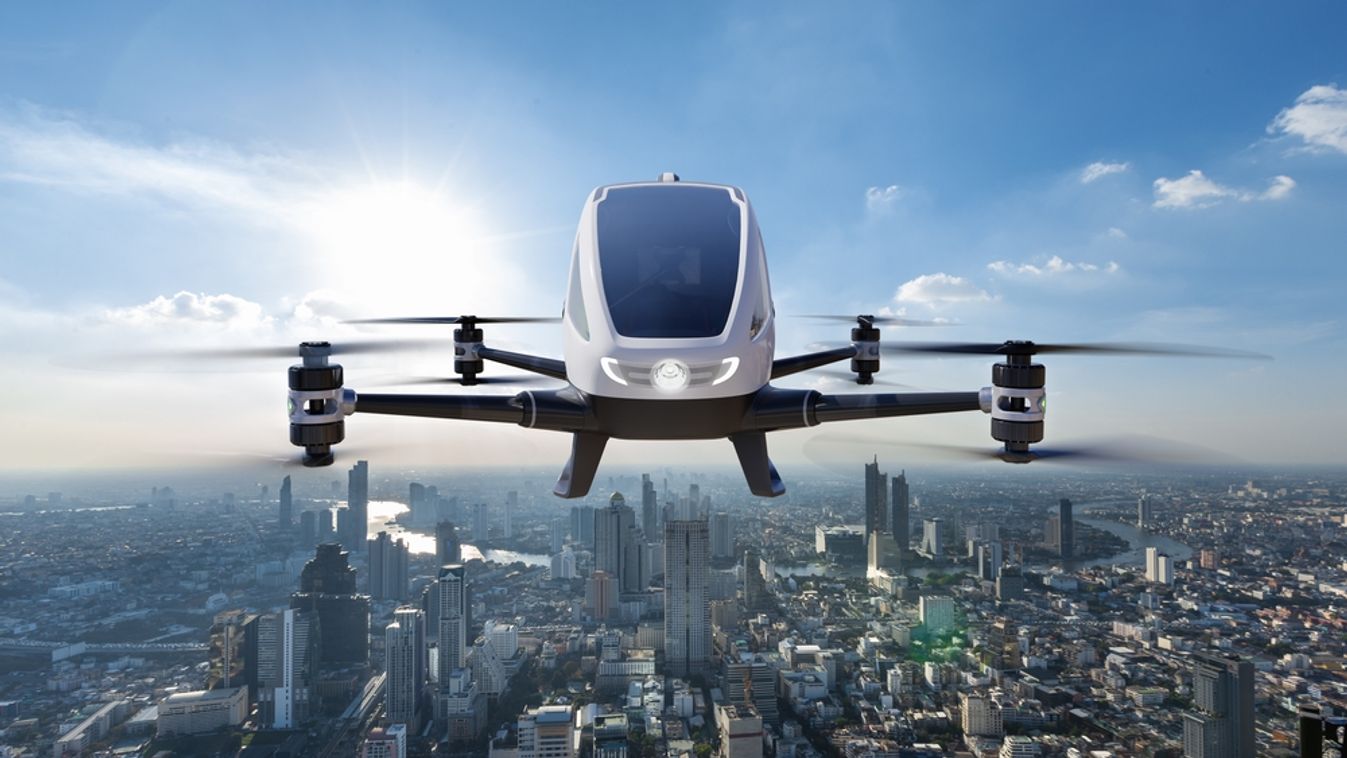 Autonomous,Driverless,Aerial,Vehicle,Flying,On,City,Background,,Future,Transportation
