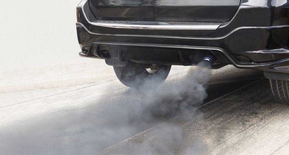 Air,Pollution,Crisis,In,City,From,Diesel,Vehicle,Exhaust,Pipe