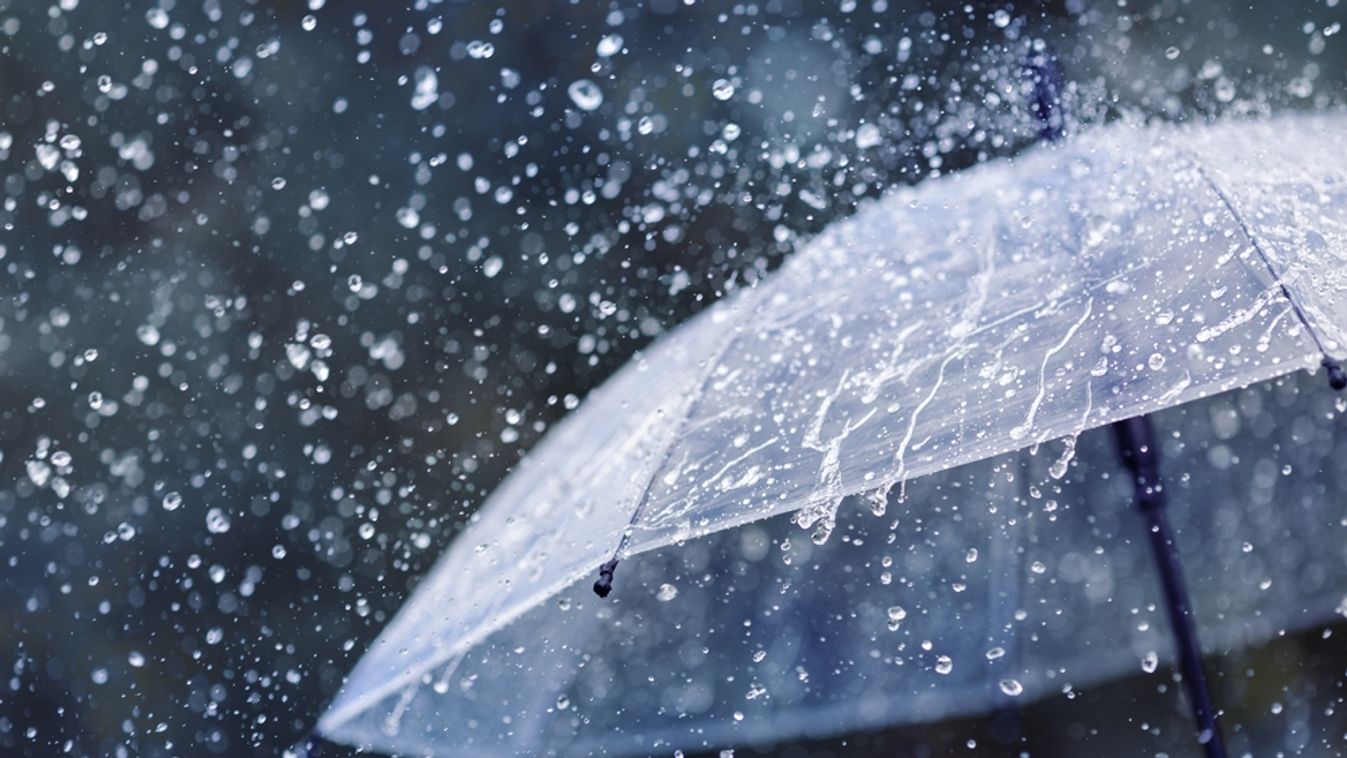 Transparent,Umbrella,Under,Heavy,Rain,Against,Water,Drops,Splash,Background.