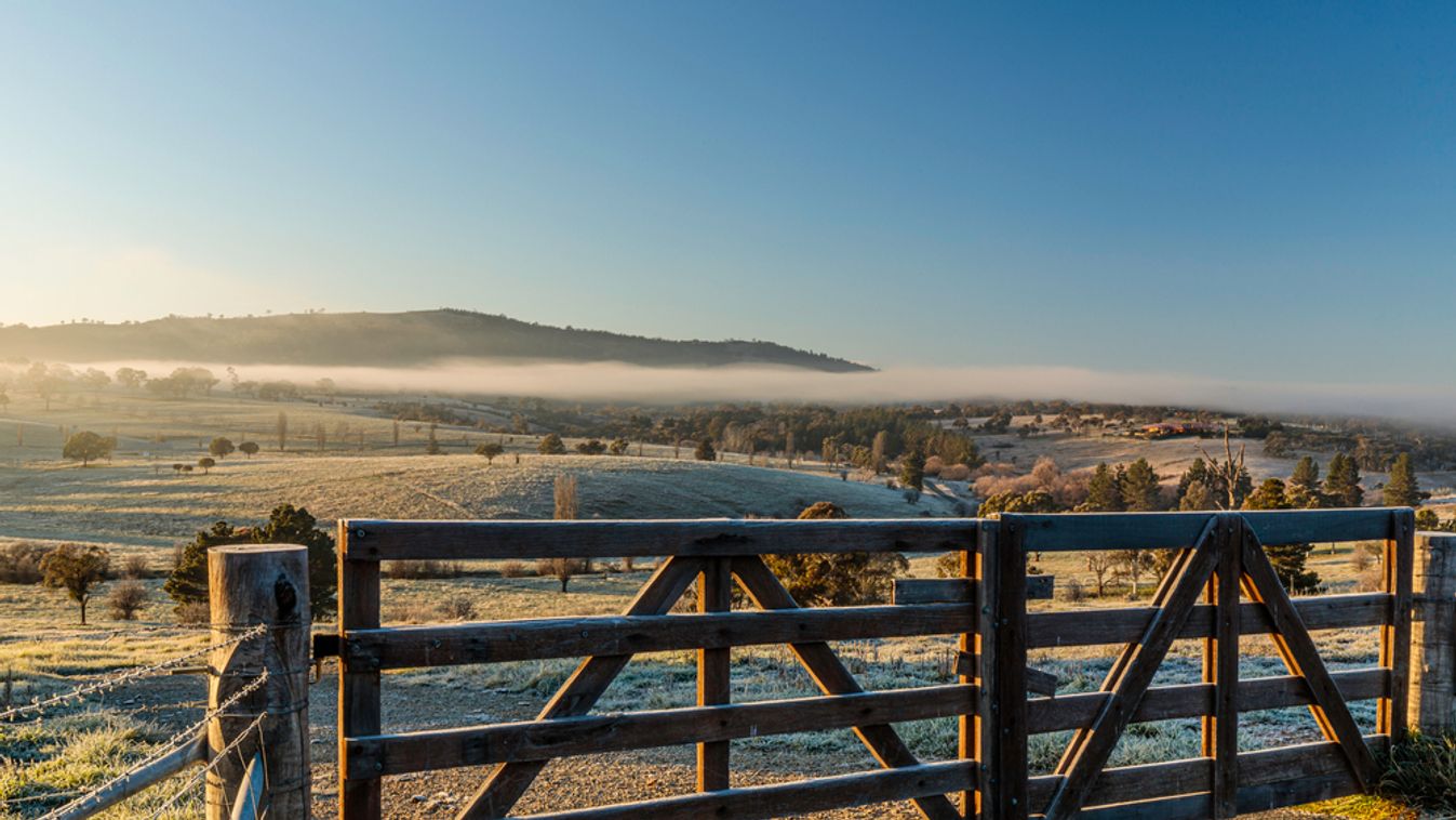 Frost-covered,Gate,Overlooking,A,Frosty,,Foggy,Valley,At,Carwoola,,Nsw,