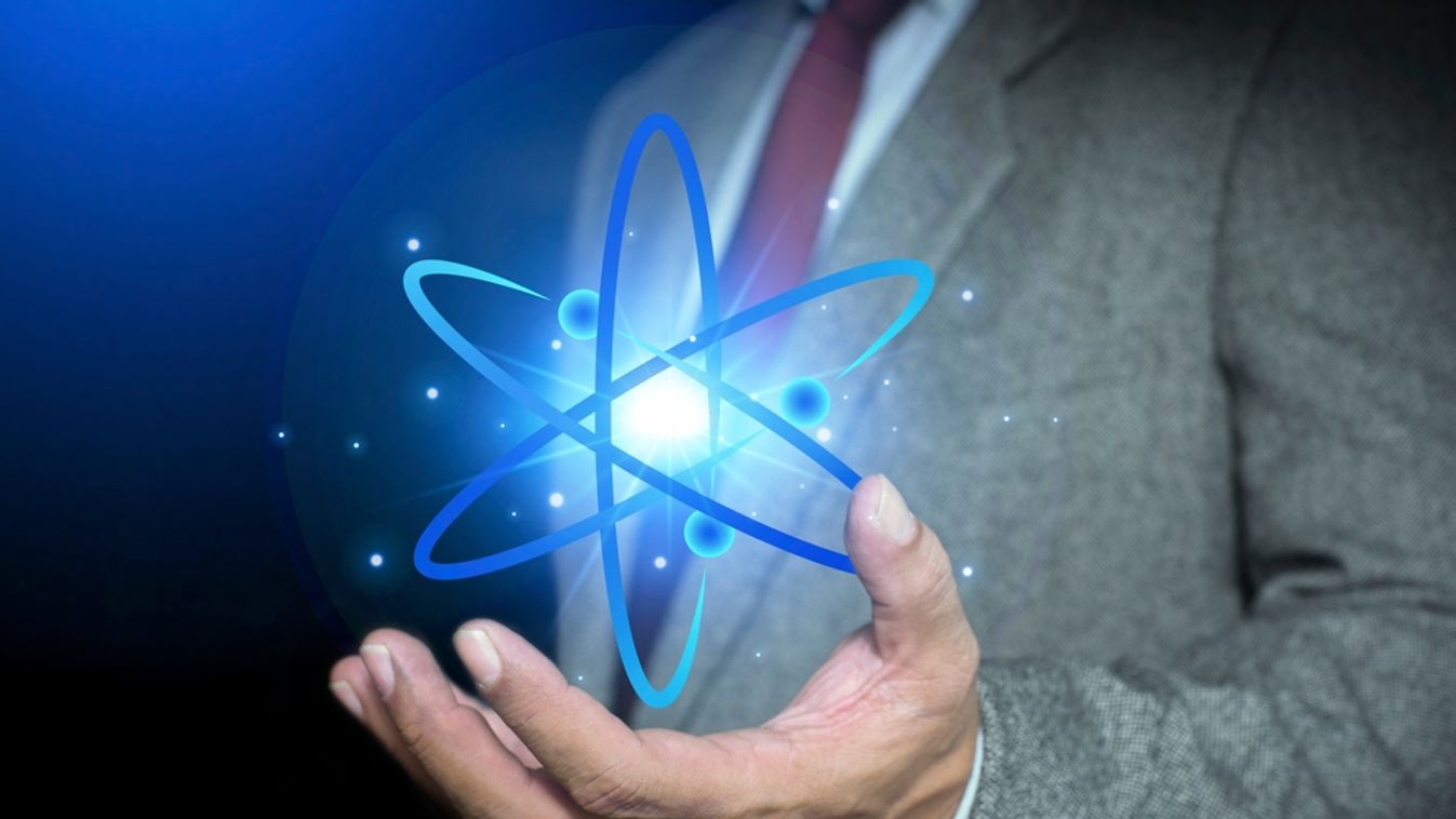 Bussinessman,Hand,Holding,Creative,Atom.,Nuclear,Fusion,Concept,,Endless,Energy,