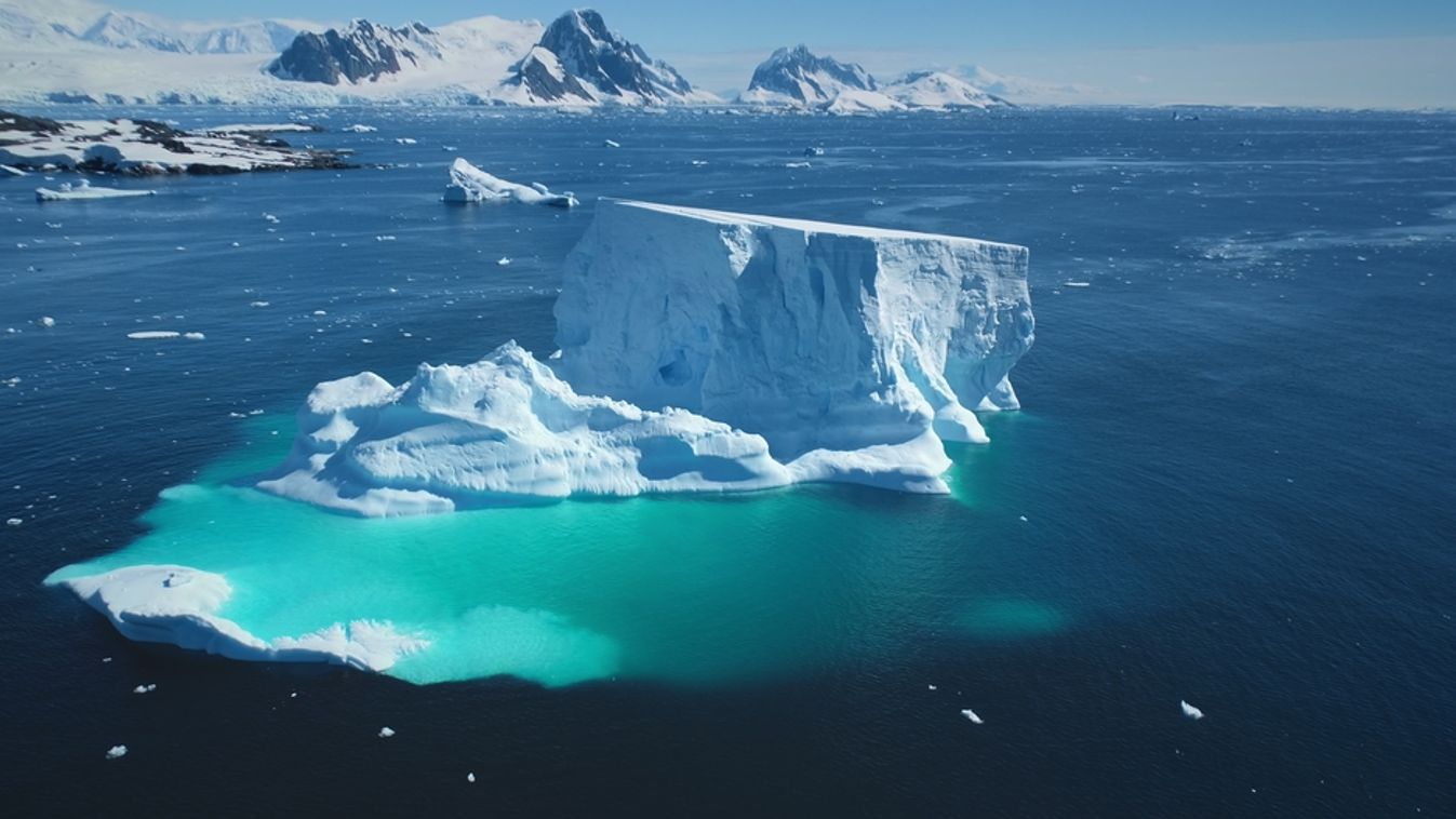 Giant,Iceberg,Towering,Melting,Blue,Underwater,Ice.,Natural,Beauty,And