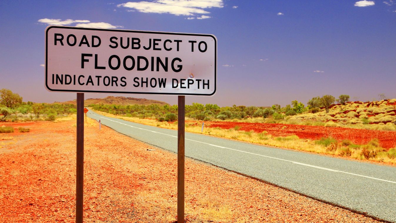 Road,Sign,For,Flooding,In,Australian,Desert