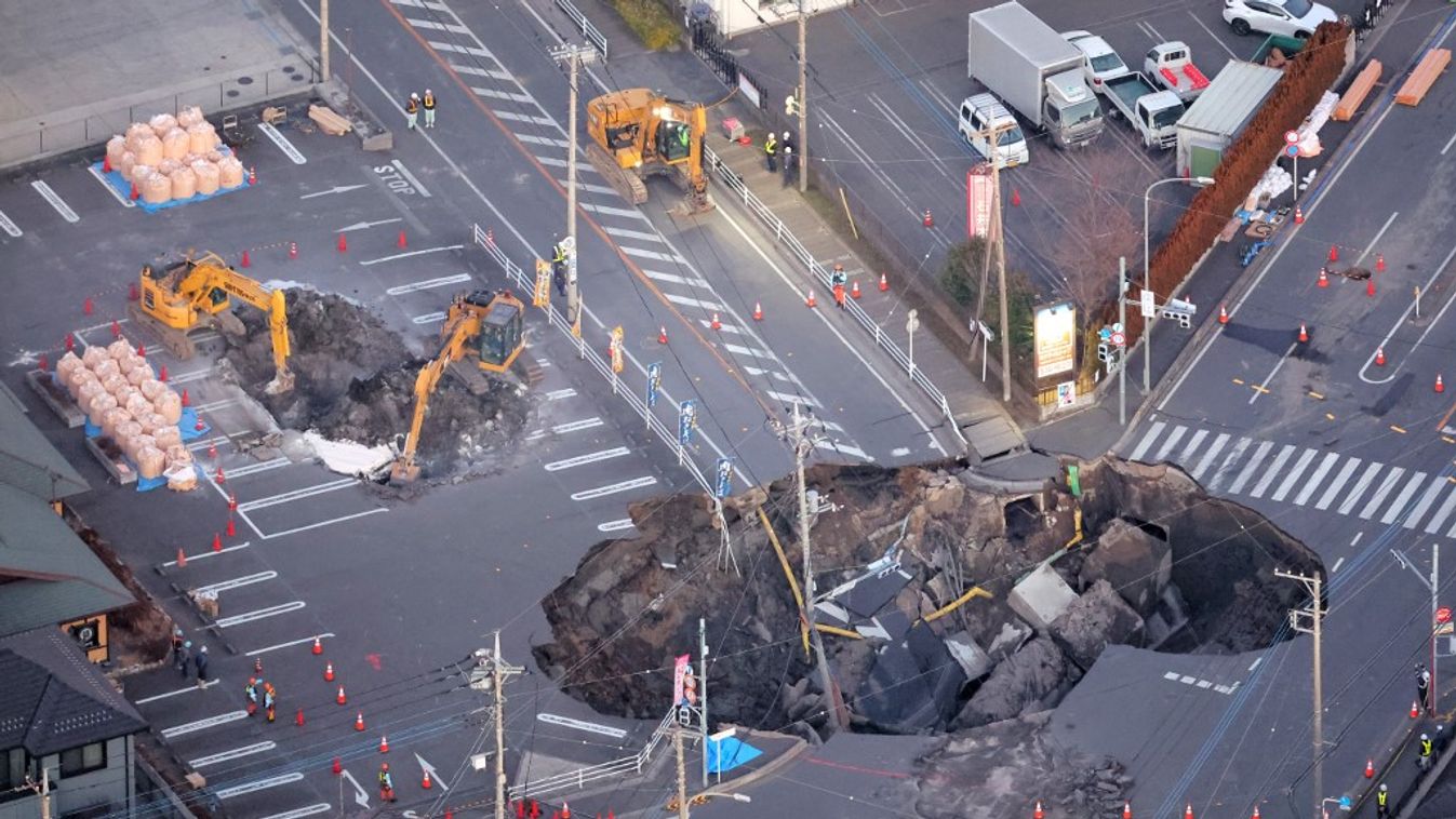 Truck falls into sinkhole in Yashio, Japan