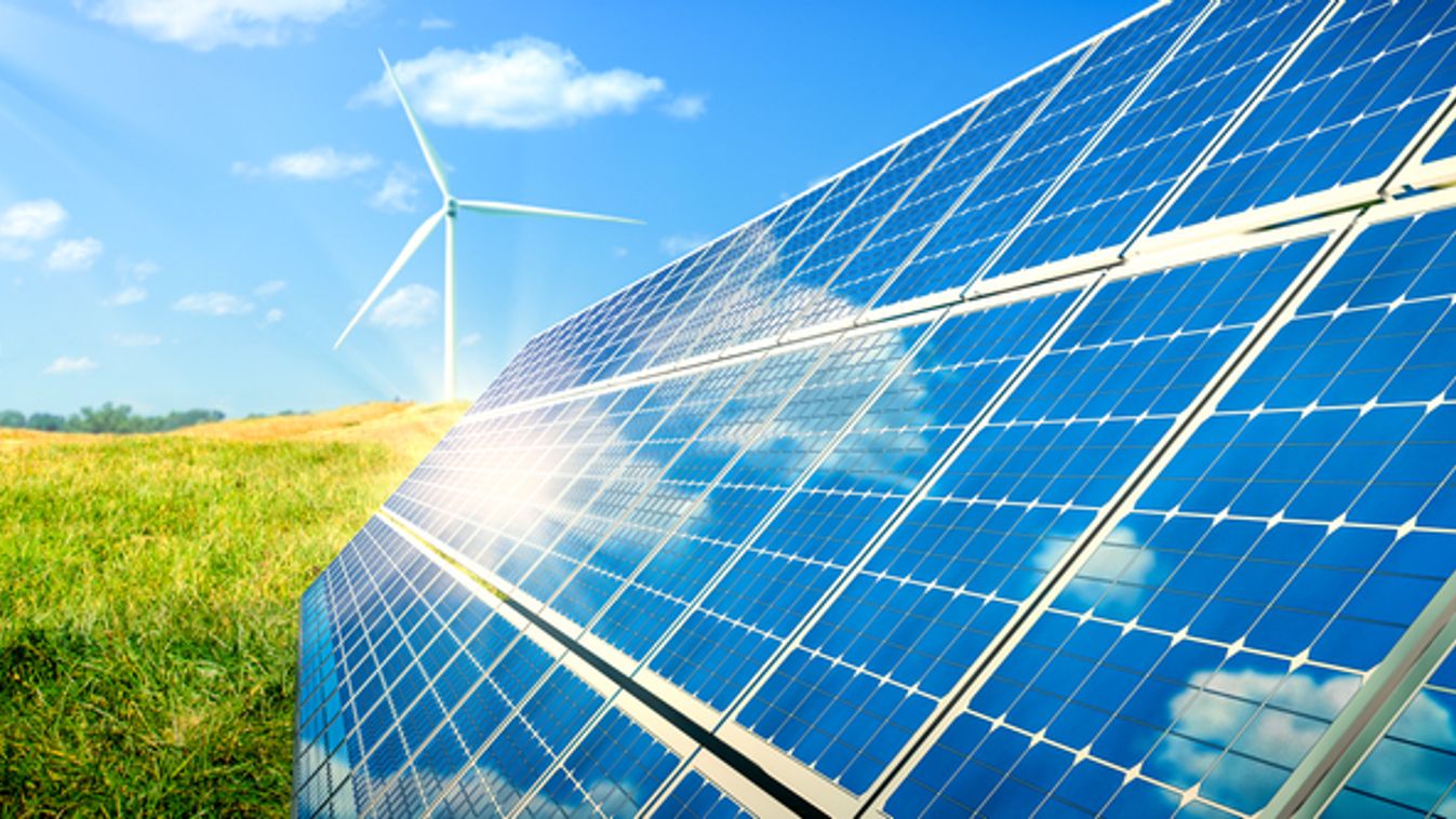 Solar,Panels,And,Wind,Turbines,In,Grassy,Field,With,Sunlight